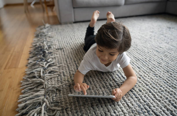 Girl lying on rug | Shoreline Flooring