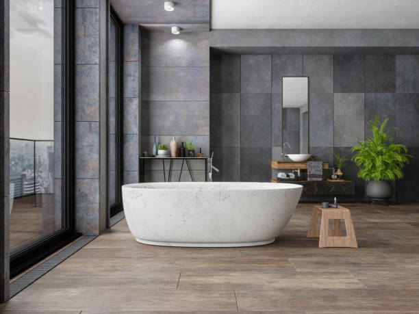 Bathroom tile dark flooring with bath tub | Shoreline Flooring