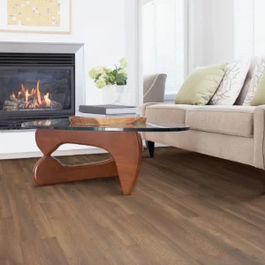 33609_04_room Laminate in a medium brown wood tone in a living room with a fireplace | Shoreline Flooring