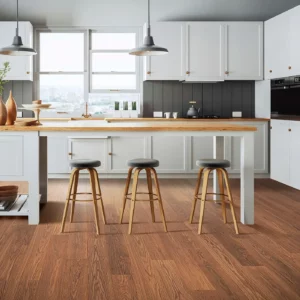 33612_03_room Mohawk Laminate in a rich reddish-brown wood color in a kitchen | Shoreline Flooring