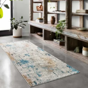 Loloi area rug in a distressed white, blue, and brown abstract pattern | Shoreline Flooring