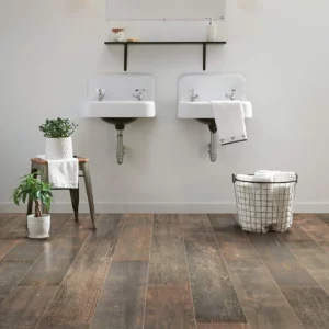 Shaw Floors tile with a dark, burned wood look, in a bathroom | Shoreline Flooring