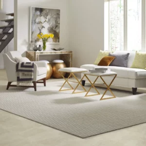 A beige Shaw Floors area rug | Shoreline Flooring